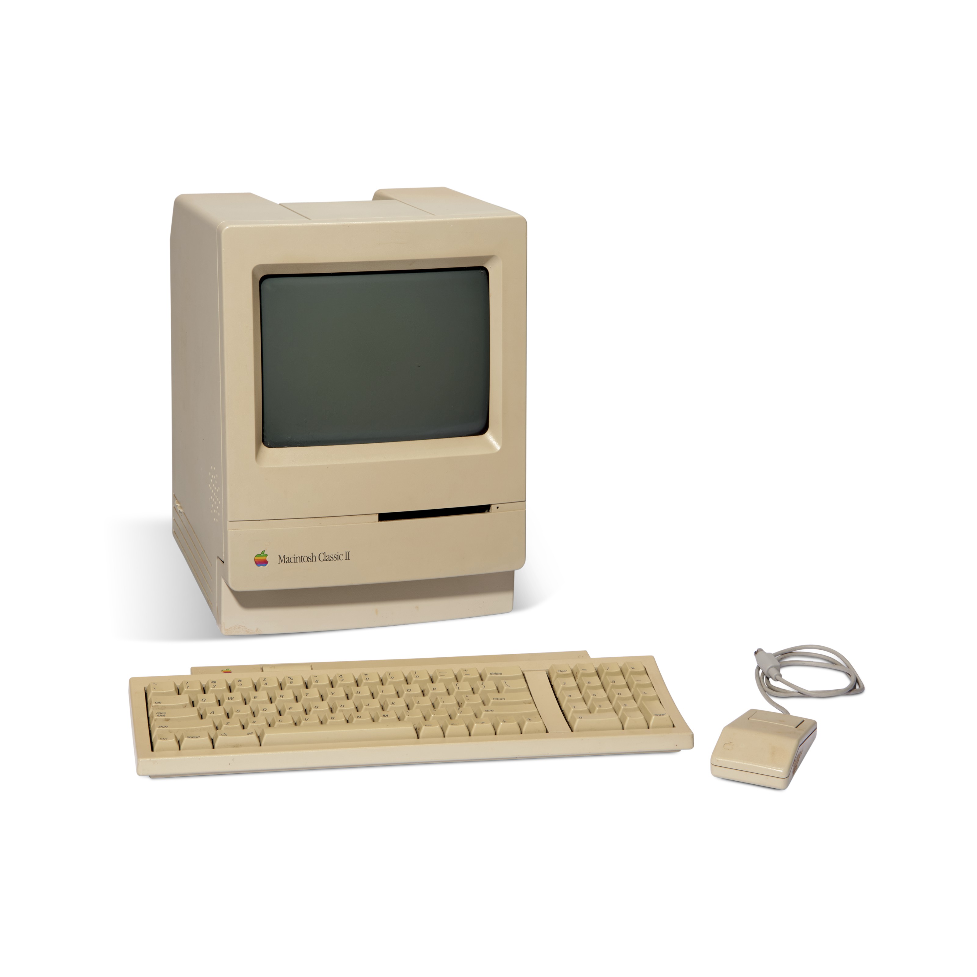 A MACINTOSH CLASSIC II SIGNED BY JOBS AND WOZ, APPLE COMPUTER INC